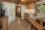 The kitchen is well-equipped with a Refrigerator, Coffee Maker, Microwave, Toaster, Cookware and Dishwasher